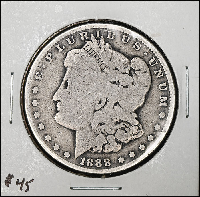 1888-O VAM-4 "Hot Lips" Morgan Dollar in VG-8. I paid $40.