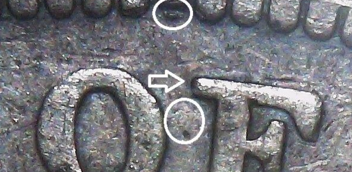 This is a close-up image of a fake 1836 Gobrecht Dollar.