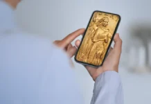 Coin Scammers Using Google Mobile App Warns NCIC AI Generated image of coin collector looking at a Saint-Gaudens Double Eagle.